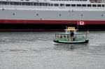 One Of The Many Victoria Habour Ferries Pottering Along In Vict Stock Photo