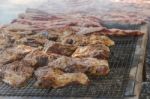 Traditional Meat Grilled On The Grill In The Argentine Countryside Stock Photo