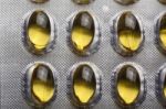 Yellow Oil Pills Stock Photo