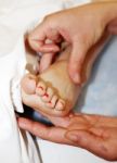 Foot Massage In The Spa Salon Stock Photo