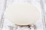 Duck Egg On White Painted Table Surface Stock Photo