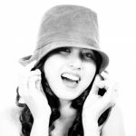 Fashionable Young Girl Wearing A Hat Stock Photo