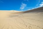 Sand And The Blue Sky Stock Photo