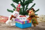 Snowman With Christmas Gift Stock Photo