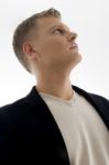 Portrait Of Handsome Man Looking Upward Stock Photo