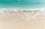 White Sand And Blue Sea Stock Photo