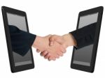 Handshaking People With Tablet Pc Stock Photo