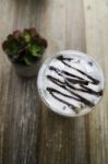 Iced Mocha Coffee On Wooden Table Stock Photo