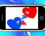 Two Hearts On Smartphone Shows Marriage Stock Photo