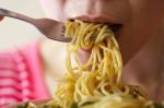 Woman Is Eating Spaghetti Stock Photo