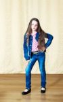 Girl In A Blue Denim Suit Stock Photo