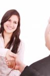 Handshaking Business People Stock Photo