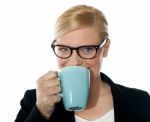 Attractive Corporate Female Drinking Coffee Stock Photo