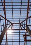 Metal Structure Of House Roof In Home Construction Site And Sun Stock Photo