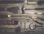 Set Of Tools Over A Wood Background Stock Photo