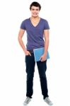 College Student Holding Notebook Stock Photo