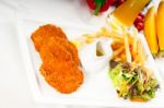 Classic Milanese Veal Cutlets And Vegetables Stock Photo