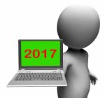 Two Thousand And Seventeen Character Laptop Shows New Year 2017 Stock Photo