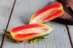 Papaya Cut On The Old Wooden Stock Photo