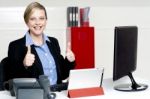 Businesswoman Gesturing Thumbs Up Stock Photo