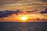 Sunset At Sea With Beautiful Clouds In The Evening And Twilight Stock Photo