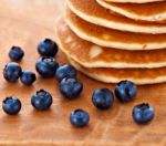 Stack Of Pancakes With Fresh Blueberries Stock Photo