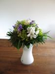 Flower Bouquet On Wooden Table Stock Photo