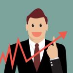 Businessman Pointing At Growth Graph Stock Photo