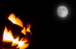 Halloween Scary Face Pumpkin  On Black Background Stock Photo