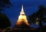 Ancient Pagoda At Twilight, Wat Mahathat In Sukhothai Historical Stock Photo