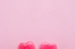 Two Pink Valentine's Day Heart Shape Lollipop Candy On Empty Pastel Pink Paper Background. Love Concept. Top View. Minimalism Colorful Hipster Style Stock Photo