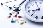 Clock With Medicine Stock Photo