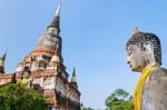 Buddha Statue And Ancient Pagoda Stock Photo