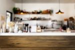 Selected Focus Empty Brown Wooden Table And Coffee Shop Or Resta Stock Photo