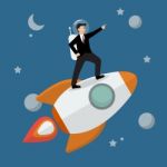 Businessman Astronaut Standing On A Rocket Stock Photo