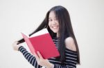 Portrait Of Thai Teen Beautiful Girl Reading Book Stock Photo