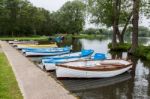 Group Of Rowing Boats At Thorpeness Boating Lake Stock Photo