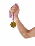 Hand And Gold Medal Isolated On White Stock Photo