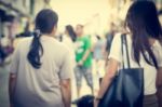 Blurred People Walking On The Street Of Old Town Stock Photo