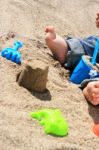 Baby On The Beach Stock Photo