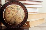 Globe On Floor Of Library Stock Photo