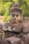 Statue Of Ancient Khmer Warrior Head At Angkor Wat Stock Photo