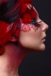 Young Girl With Red Hair And Creative Ingenious Makeup Stock Photo