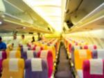 Blury Shot  Inside Wide Body  Airplane With Passenger Stock Photo