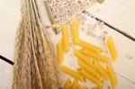 Italian Pasta Penne With Wheat Stock Photo