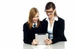 Teacher And Student Busy In Tablet Device Stock Photo