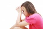 Young Woman Praying Sincerely Stock Photo