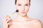 Make Up  Woman Using Blusher Brush Stock Photo