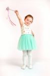 Little Girl Fashion Model In Green Dress Stock Photo