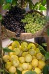 Ripe Grapes And Passion Fruit In The Basket Stock Photo